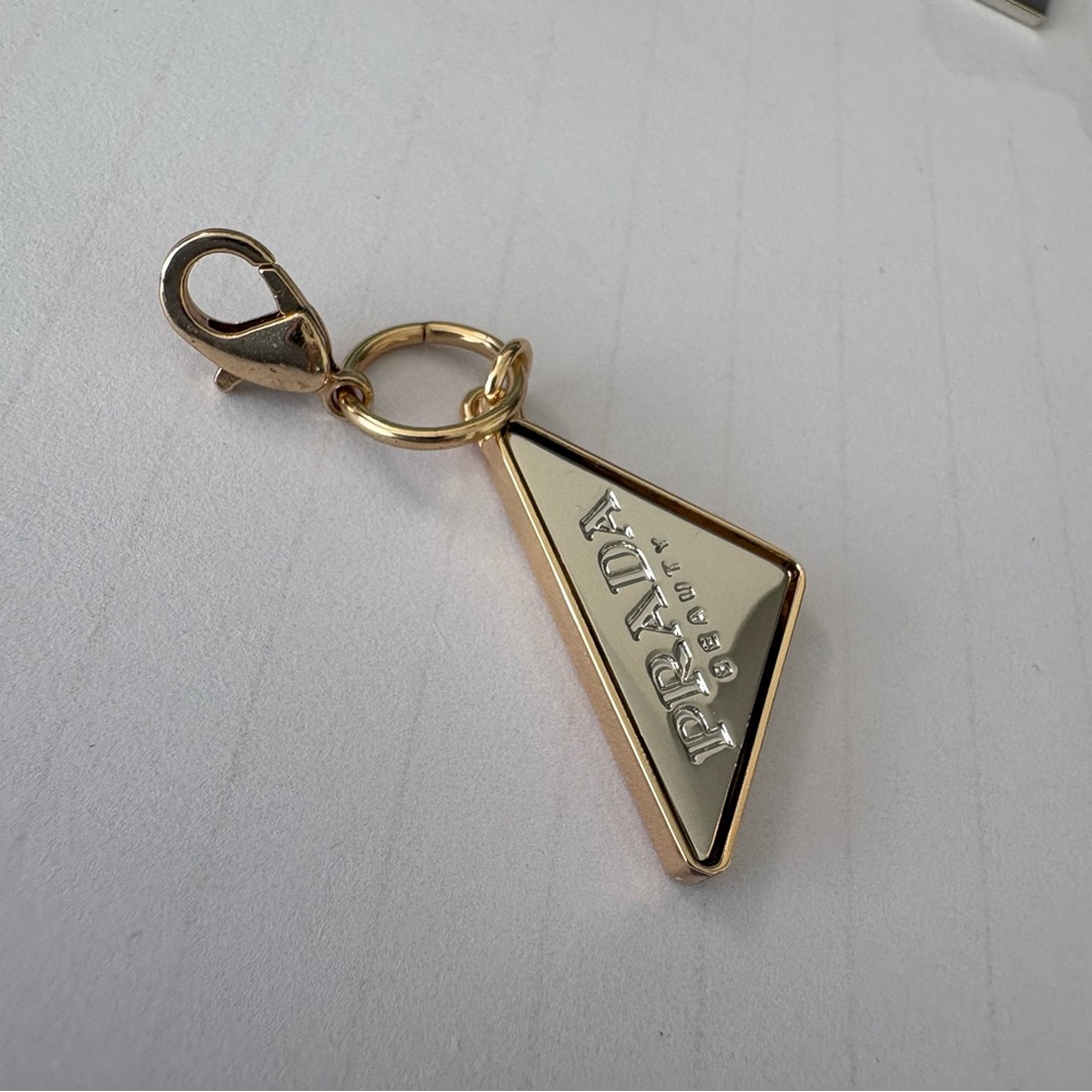 Prada Gold Triangle Logo Charm with Cream Enamel - Picture 6 of 9